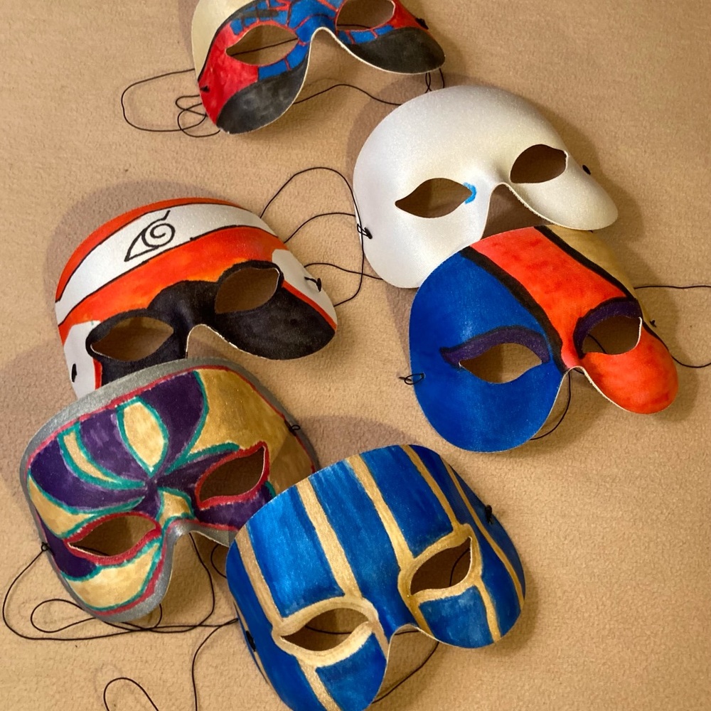 Set of six original hand painted fantastical masks for a grand celebration.